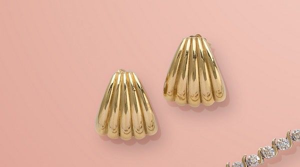 PAIRE DE PUCES D'OREILLES en or (750) à ...