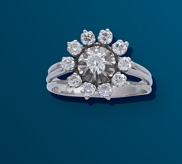 BAGUE fleur en or gris (750) ornée de onze...