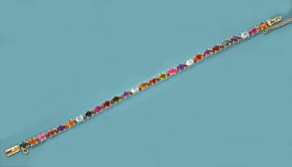 BRACELET tutti frutti en or jaune (750) serti...