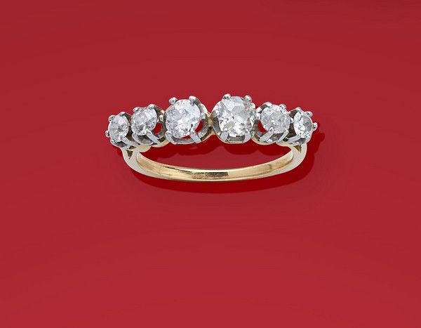 BAGUE JARRETIERE en or (750) ornée de 6 diamants...