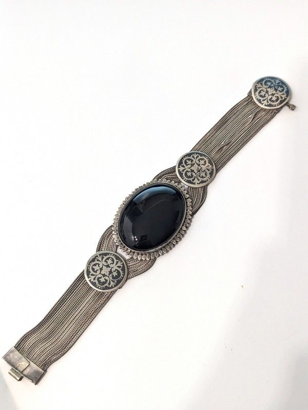 BRACELET souple en argent (900) serti d'une...