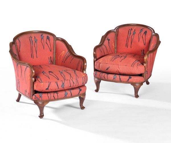 PAIRE DE FAUTEUILS bas à dossier cabriolet...