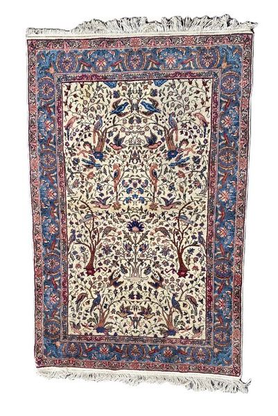 TAPIS en laine rectangulaire à décor polychrome...