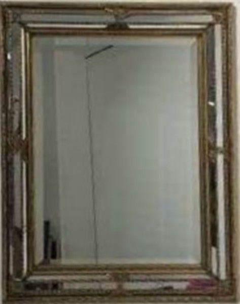 PETIT MIROIR rocaille en bois et stuc doré...