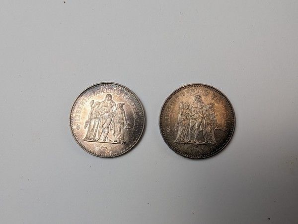 DEUX PIECES DE 50 F Hercule en argent, 1976...