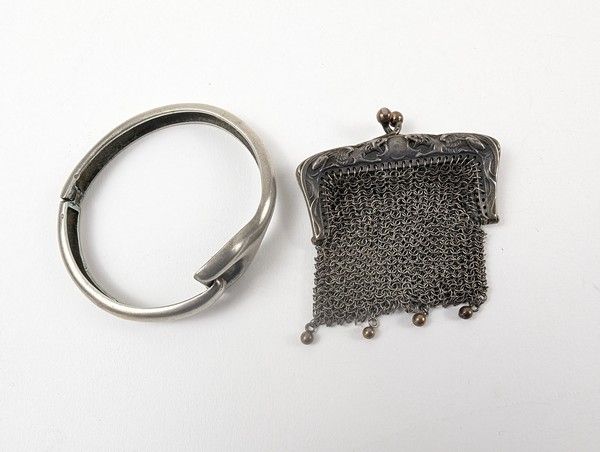 BRACELET rigide articulé en argent (800)...