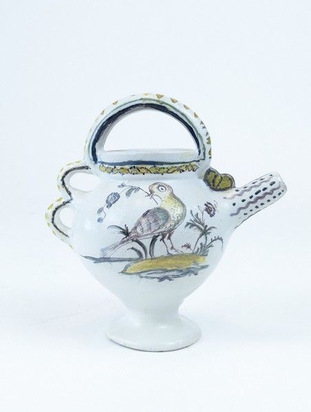 PETITE CHEVRETTE en faïence émaillée polychrome...