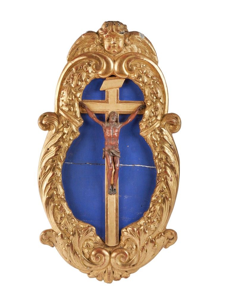 CRUCIFIX formé d'un Christ la tête vers le...