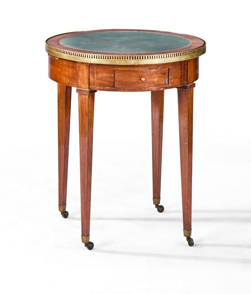 TABLE BOUILLOTTE en acajou et placage d'acajou,...