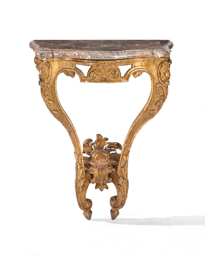CONSOLE en bois doré et sculpté à décor de...