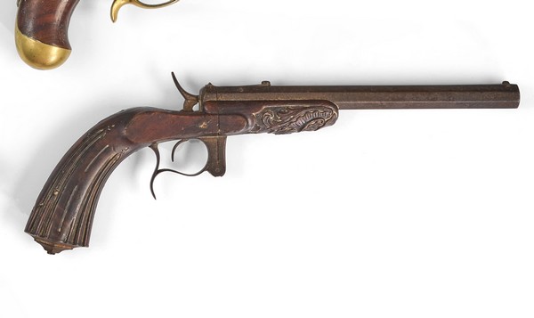 PISTOLET DE TIR à percussion. Canon à pans,...