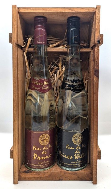 2 Blles Eaux de Vie (Poire-Williams, Prune)...