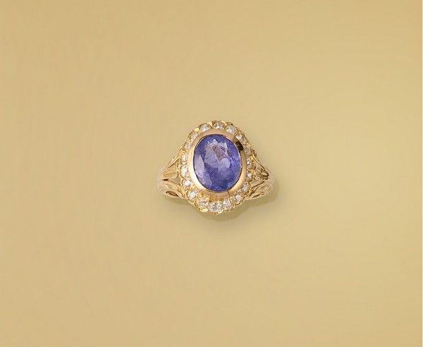 BAGUE MARGUERITE en or (750) ornée d'une...