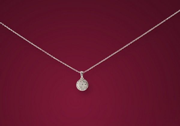 COLLIER en or gris (750), la chaîne retenant...