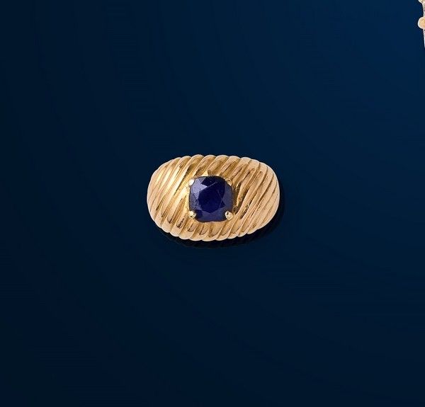BAGUE jonc torsadée en or (750) ornée d'un...