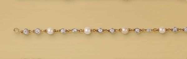 BRACELET en or jaune et gris (750) ornée...