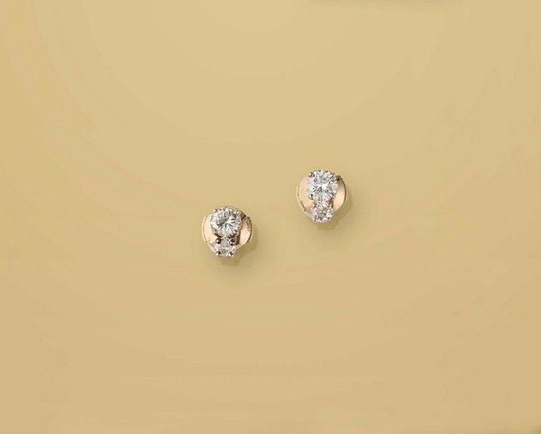 PAIRE DE BOUTONS D'OREILLES en or gris (750)...