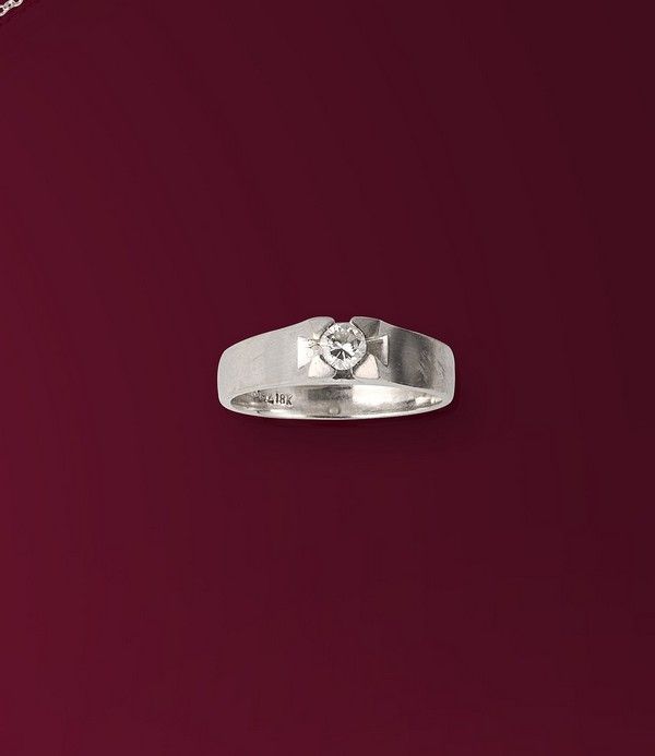 SOLITAIRE en or gris (750) avec petit diamant...