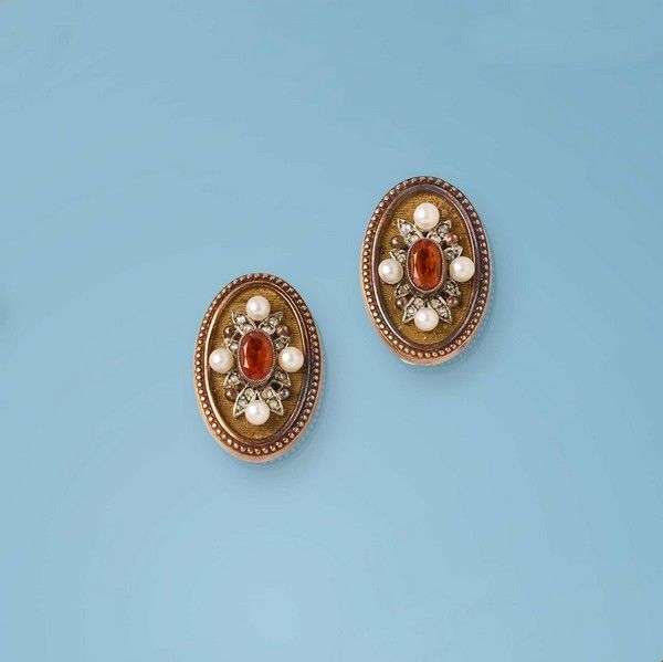 PAIRE DE CLIPS D'OREILLES en or jaune (750)...