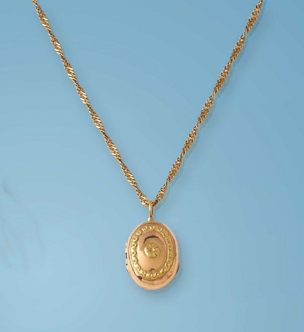 PENDENTIF ET CHAINETTE en or jaune (750)...