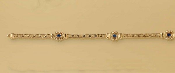 BRACELET en or jaune (750) à mailles grains...