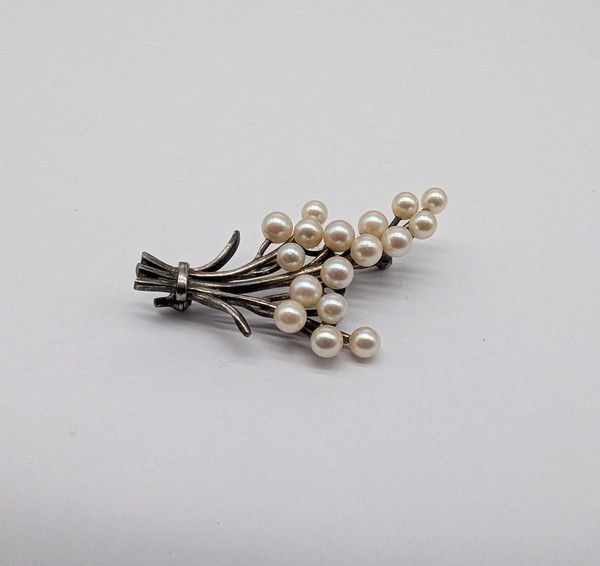 BROCHE en argent (925) de forme gerbe sertie...