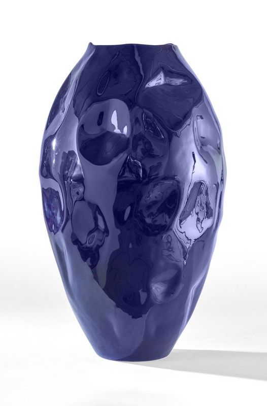 GRAND VASE de forme balustre en faïence émaillée...