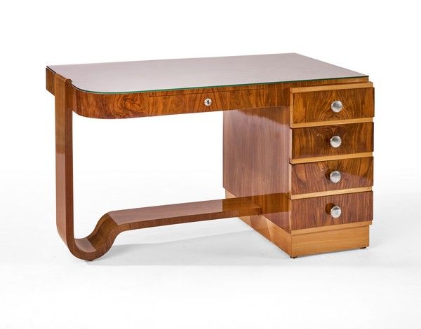 BUREAU plat en placage de palissandre, de...