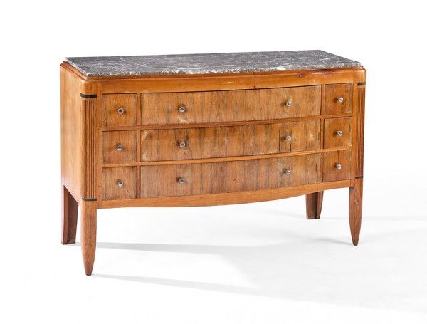 COMMODE à façade galbée en placage de palissandre...