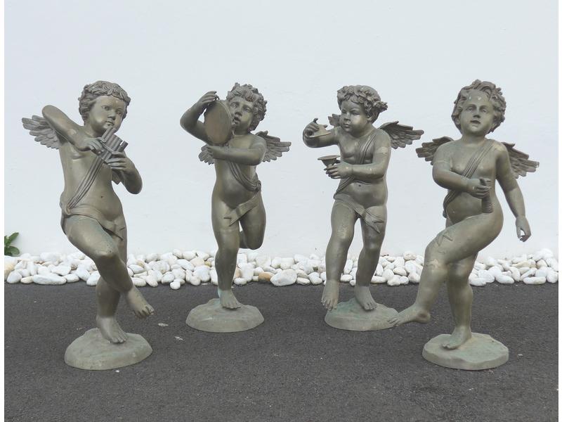SUITE DE QUATRE ANGELOTS MUSICIENS en fonte...