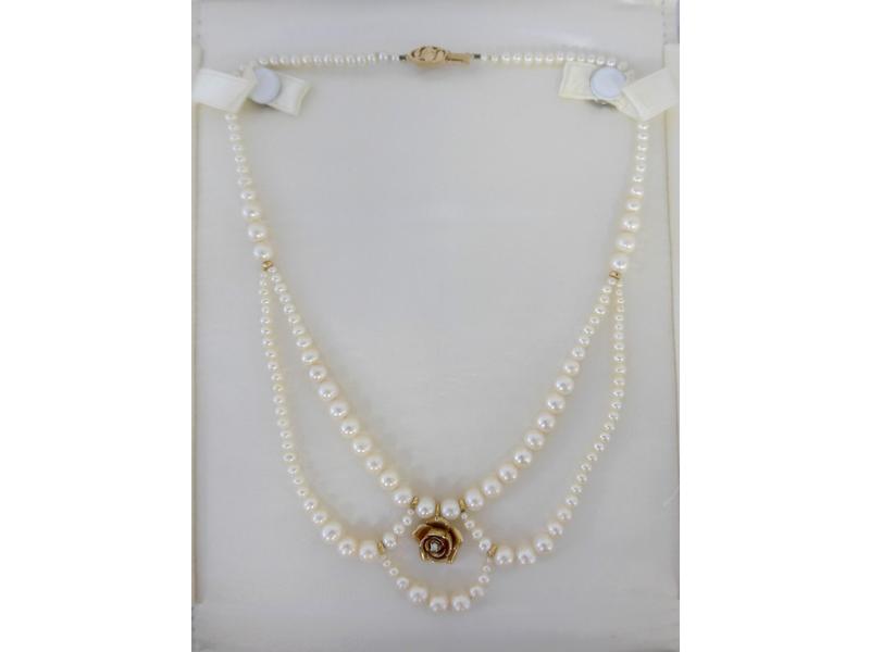 COLLIER DRAPERIE en perles, sertie d'une...