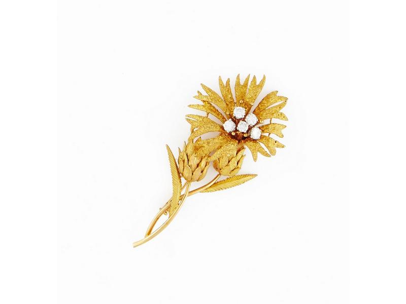 BROCHE FLEURS en or jaune (750) et platine,...
