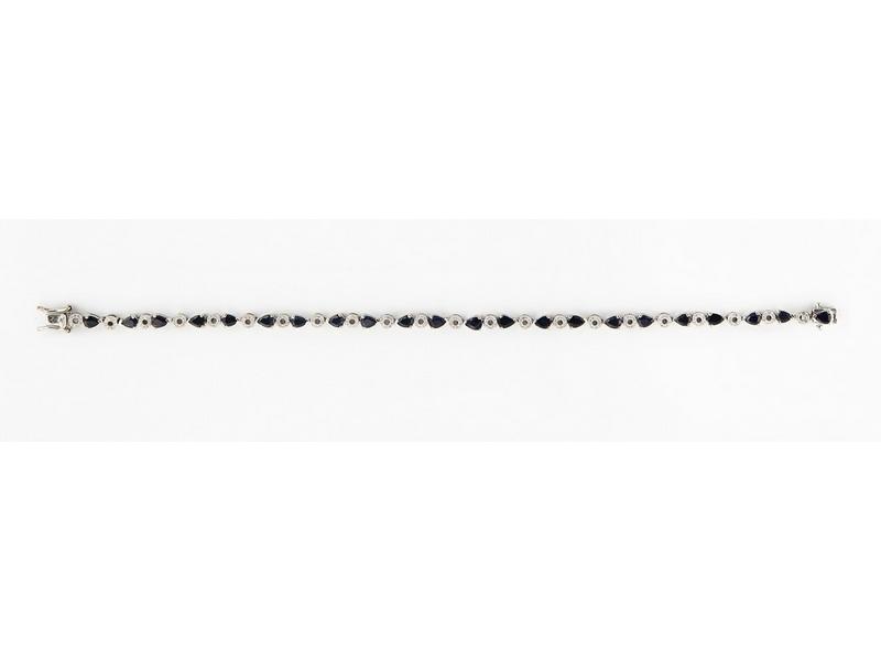BRACELET ligne en or blanc serti de petits...