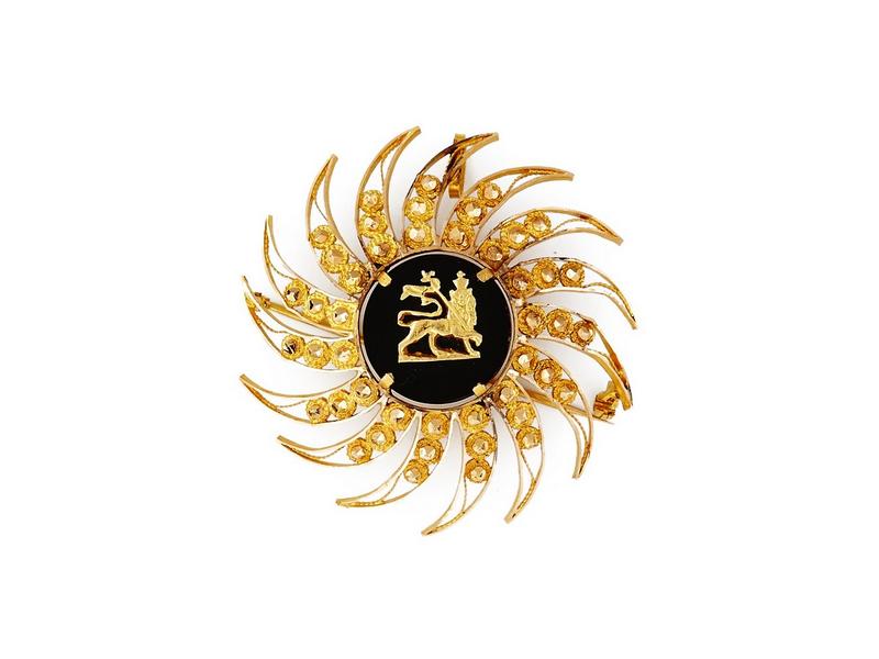 BROCHE en or jaune (750) en forme de fleurs,...