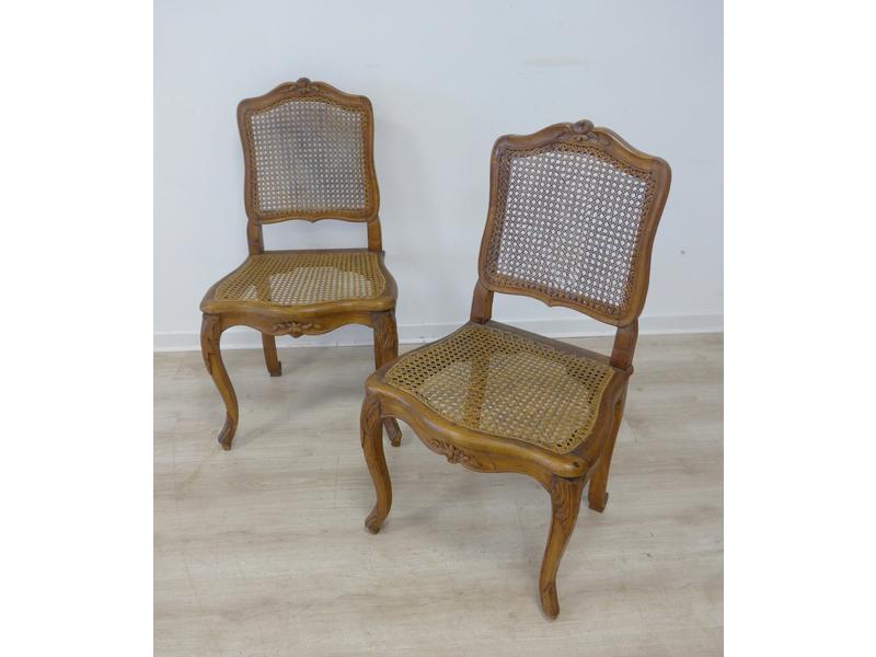 PAIRE DE CHAISES cannées en bois naturel...