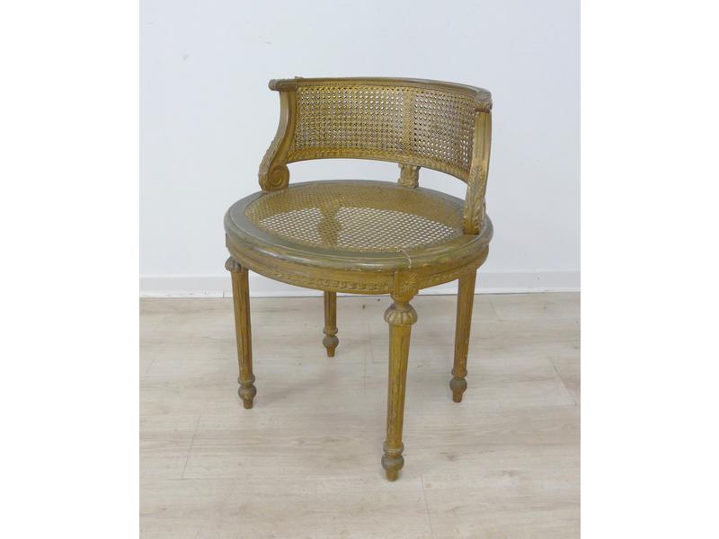 FAUTEUIL DE PIANO canné en bois doré sculpté,...