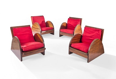 SUITE DE QUATRE FAUTEUILS bas en acajou,...