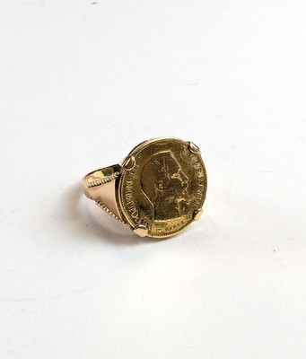 BAGUE en or (750) ornée d'un 10 F or Napoléon...