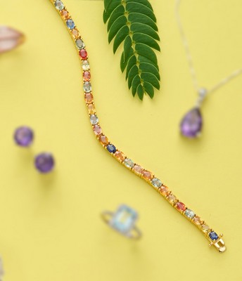 BRACELET LIGNE en argent jaune (925) orné...