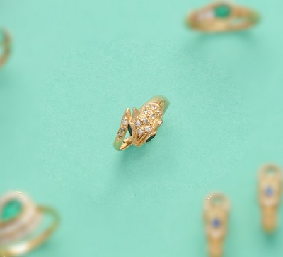BAGUE PANTHERE en or (750), pierres blanches...