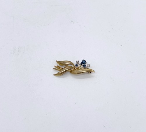 BROCHE en or (375) avec pierres bleues et...