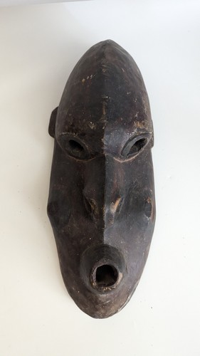 MASQUE dit BRAG représentant un personnage...