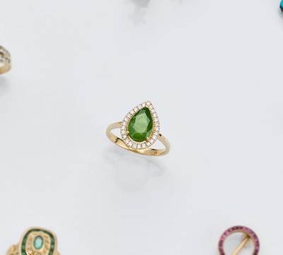 BAGUE en or (750) ornée d'un grenat tsavorite...