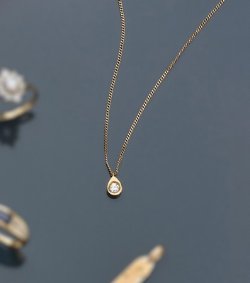 CHAÎNE et PENDENTIF en or (750) de forme...