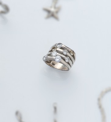 BAGUE en argent (925) à 4 branches serties...