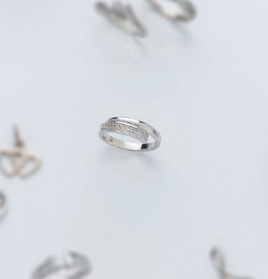 BAGUE en argent (925) formée de deux branches,...