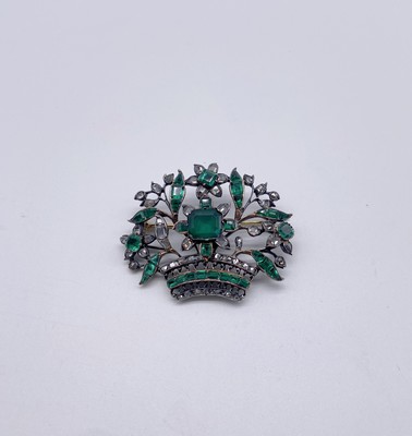 BROCHE "panier fleuri" en argent (800) sertie...