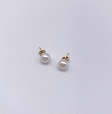 PAIRE DE CLOUS D'OREILLES en or jaune (750)...