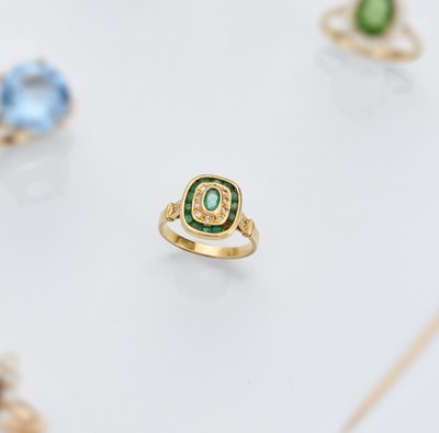 BAGUE en or (750) à chaton tonneau ornée...