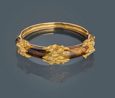 JONC RIGIDE OUVRANT en or (750) à décor de...